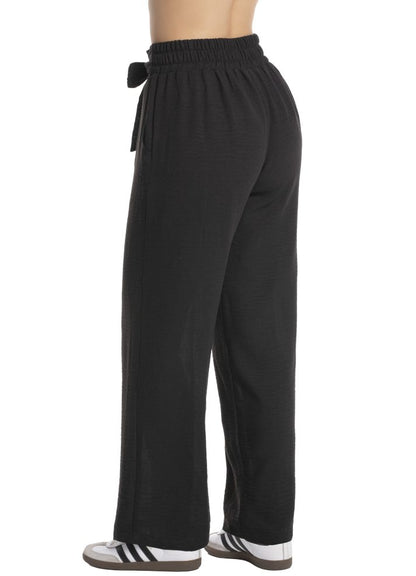 Pantalón bota ancha resortado en espalda